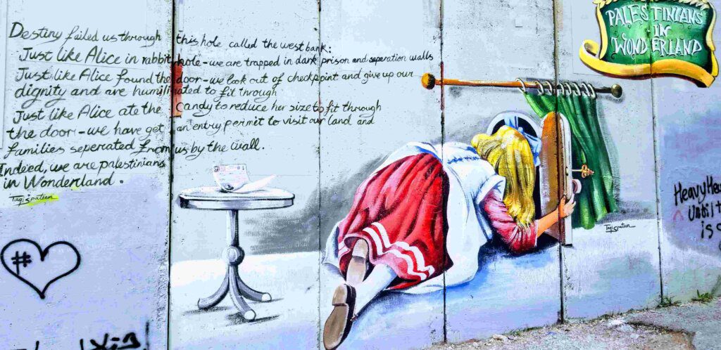 Separation wall Alice in Wonderland Banksy Bethlehem Palestine