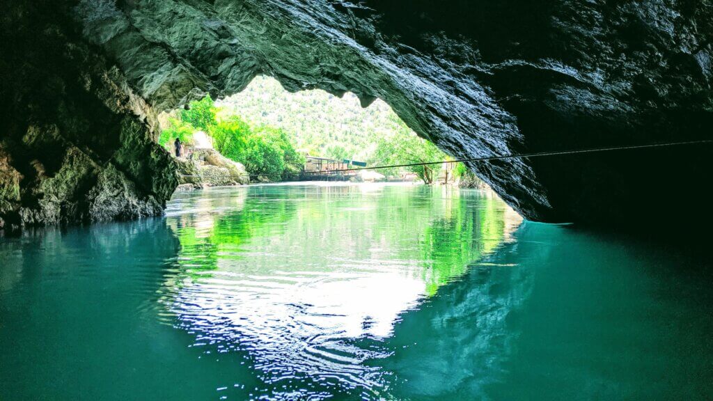 The turquoise cave in the Blagaj Monastery in Tekija is the source of the Buna River and is a must see attraction near Mostar.