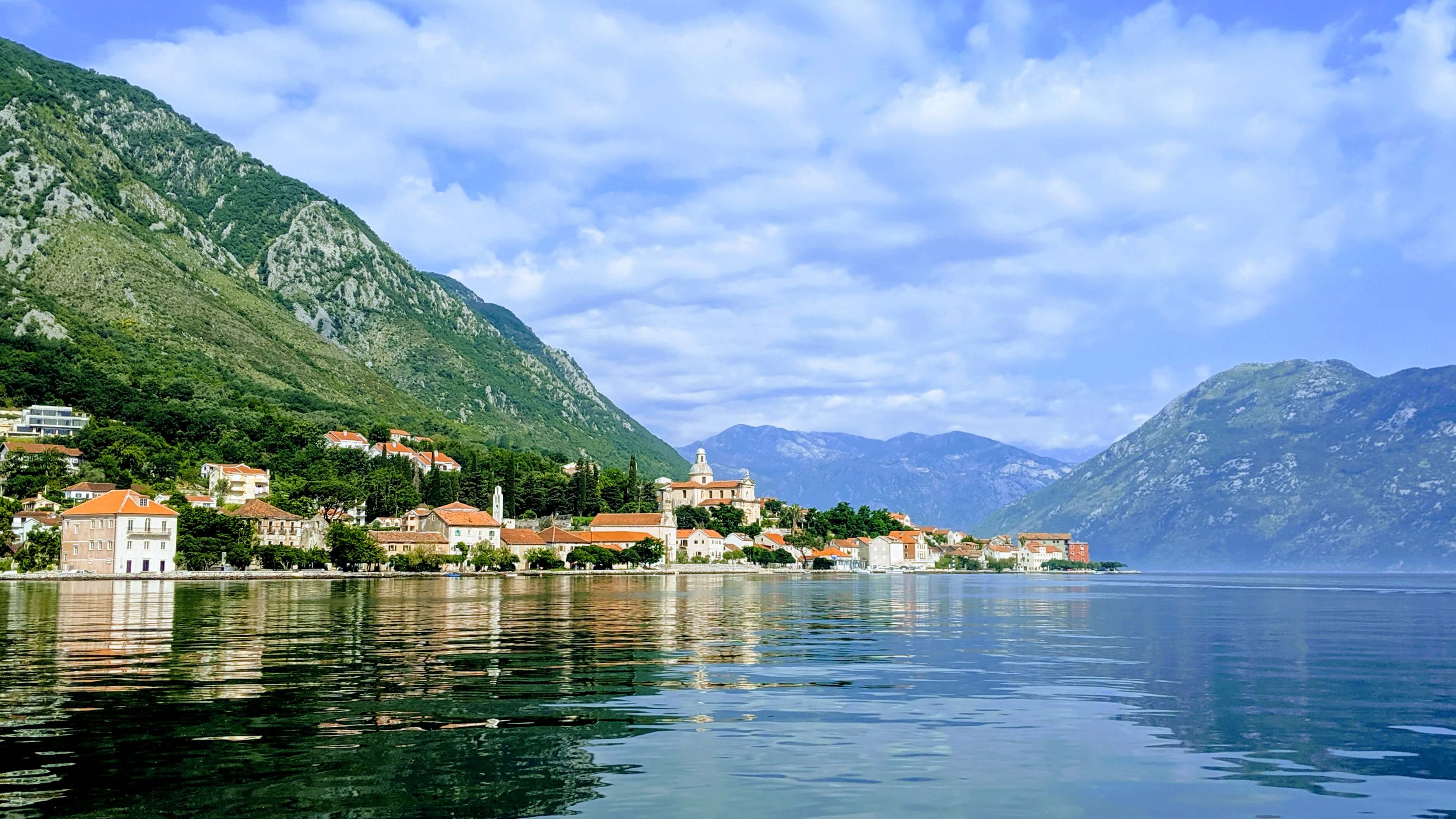 A reflection of a medieval town on Kotor Bay.