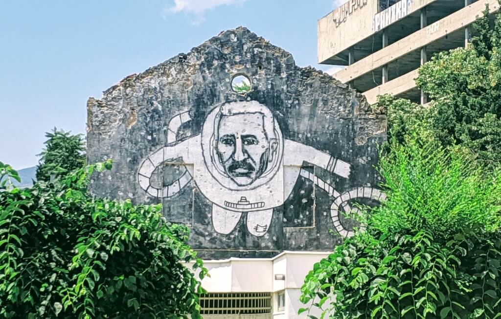 Street Art on an abandoned building of an astronaut in Mostar.