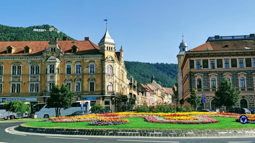 Brasov old town with the Brasov sign in the background