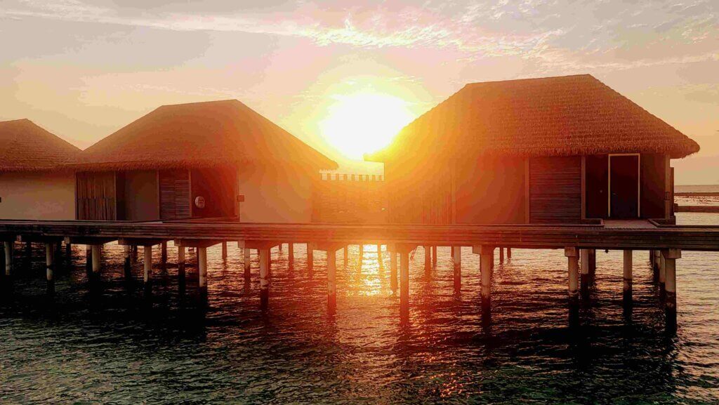 Sunset over the water bungalows